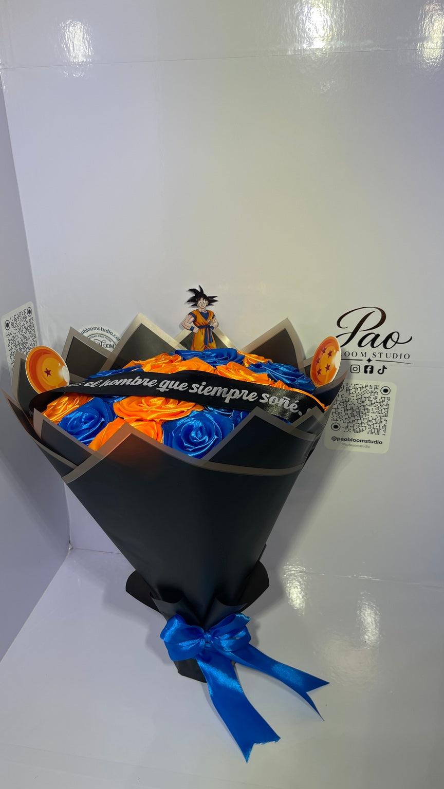 Blue and orange eternal flower bouquet angled view