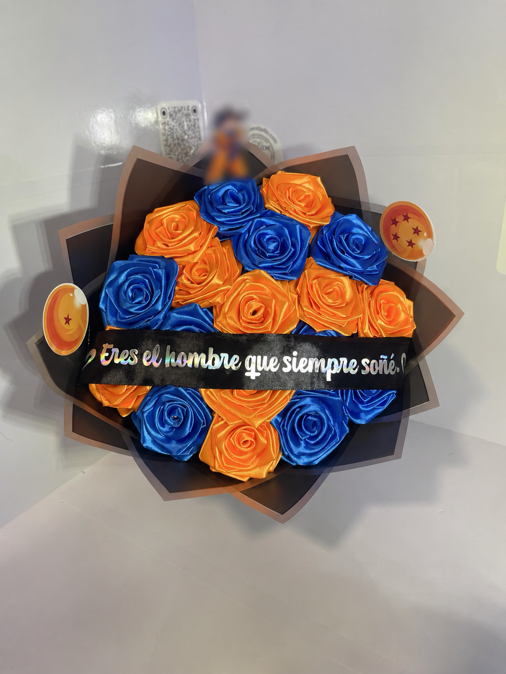 Blue and orange satin rose bouquet close view