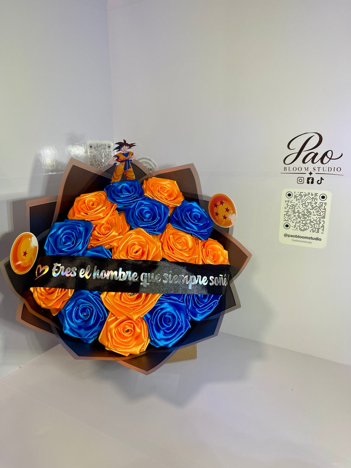 Blue and orange eternal rose bouquet front view
