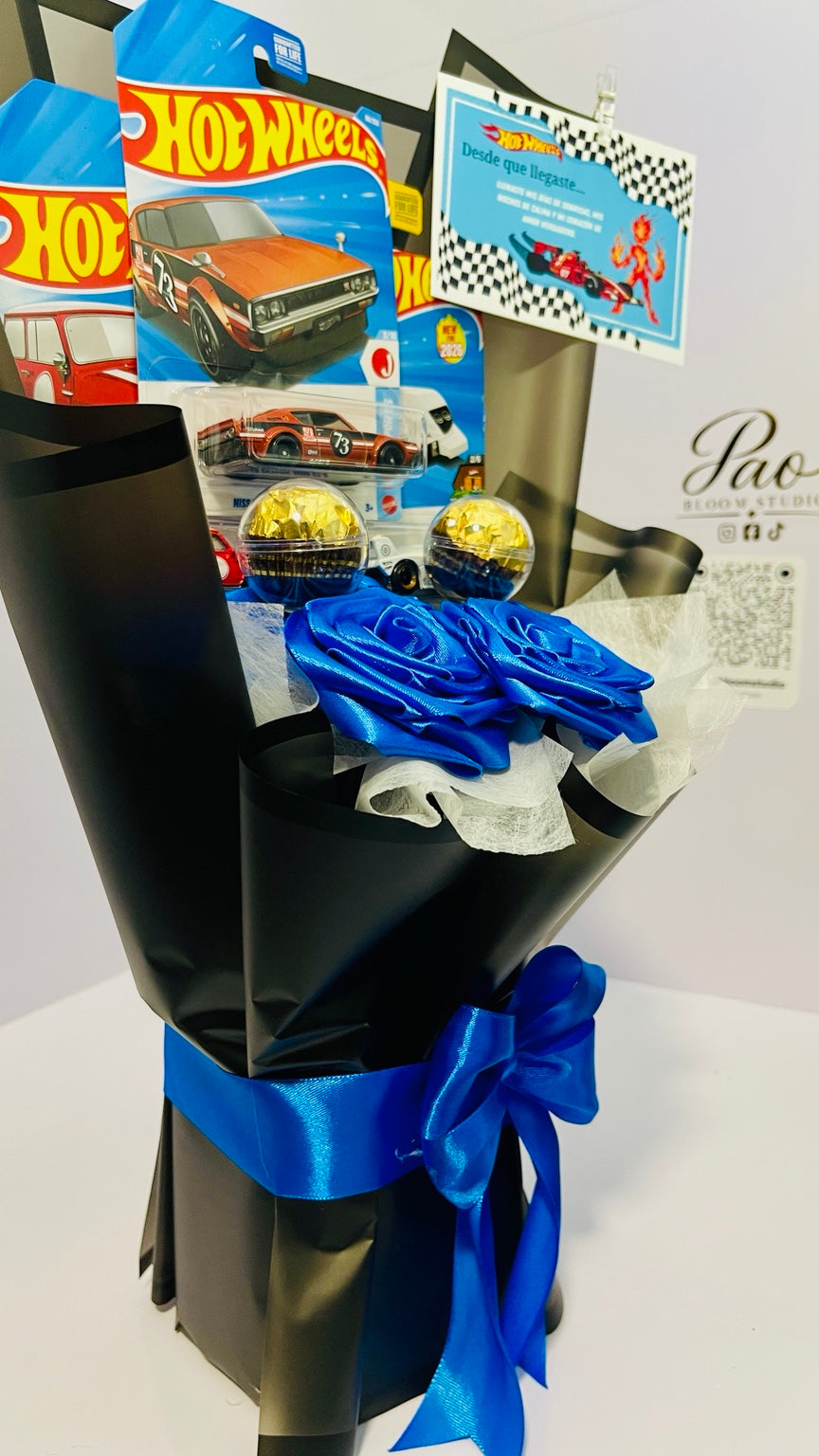 Side detail of blue satin rose gift bouquet