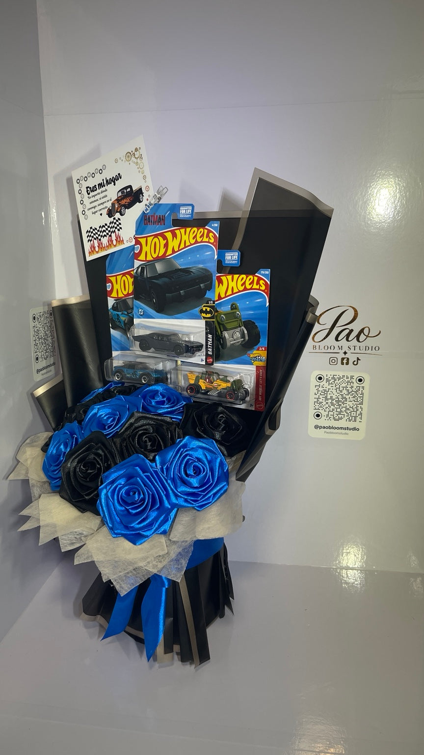 Blue and black satin rose gift bouquet front view