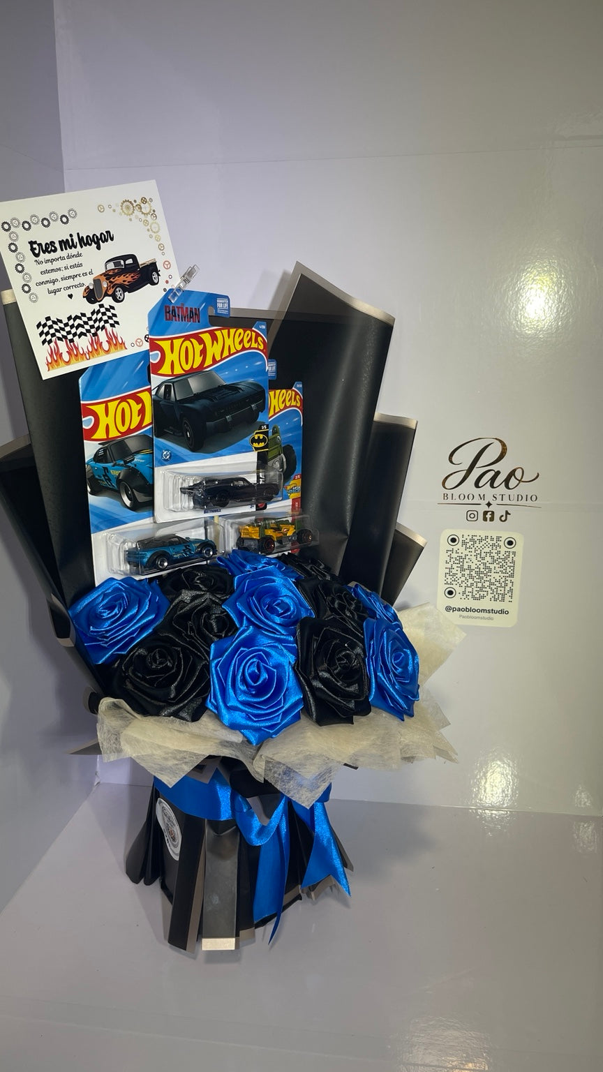 Blue racing rose bouquet with twelve satin roses and collectible toy cars