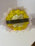 Golden yellow and ivory satin rose bouquet with pink butterfly, black Handmade with Love ribbon, and blush wrapping paper