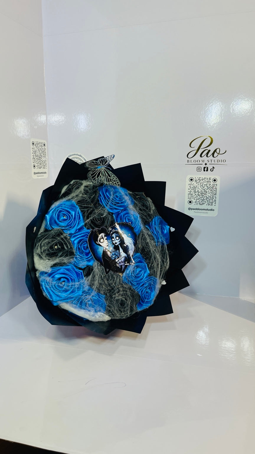 Blue and black gothic satin rose bouquet, full front view