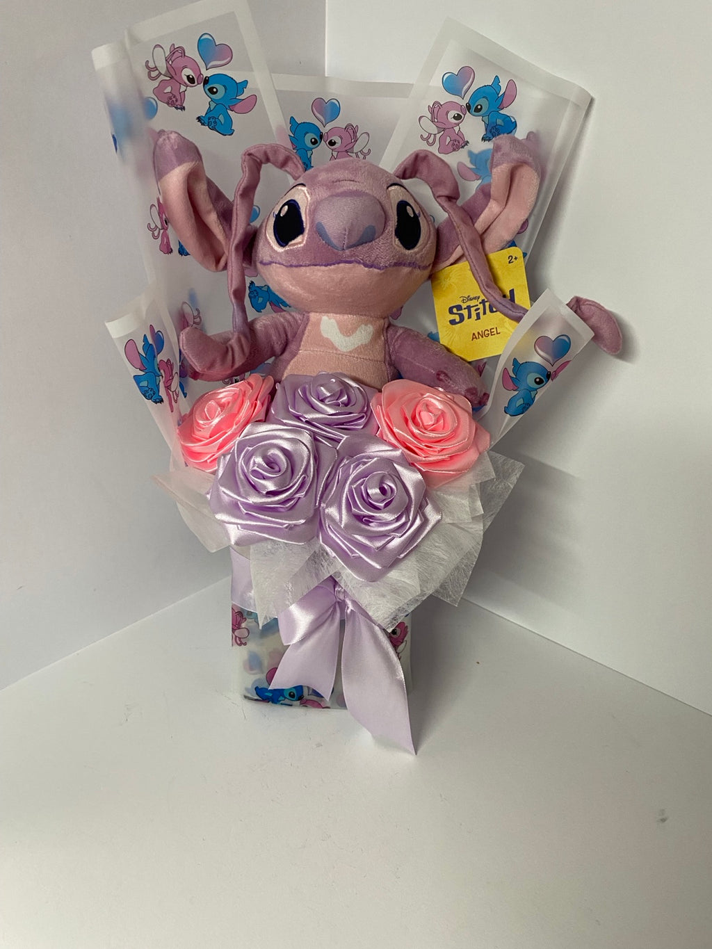 Lavender and pink satin rose plush bouquet full view