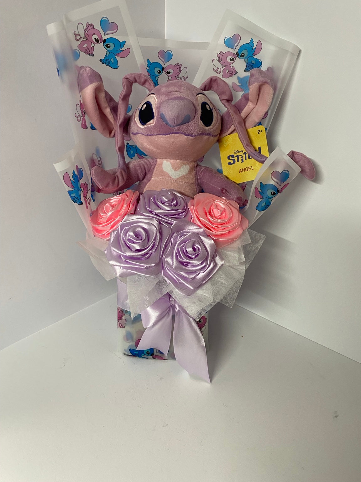Lavender and pink satin rose plush bouquet full view
