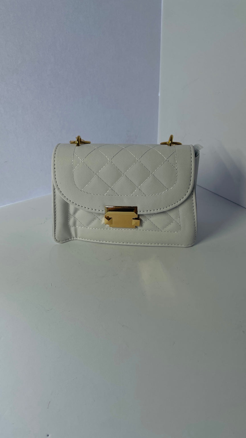 White mini quilted faux leather handbag front view