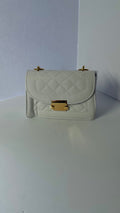 White mini quilted faux leather handbag front view