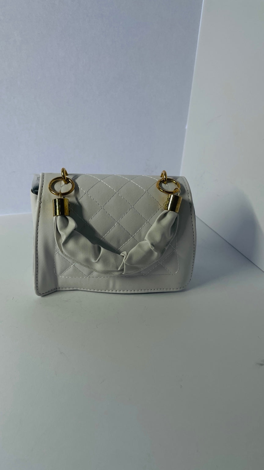 White mini quilted faux leather handbag with top handle