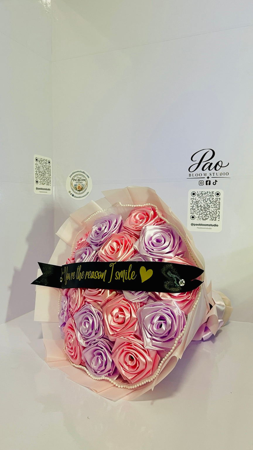Elegant display of pink and lavender everlasting rose bouquet