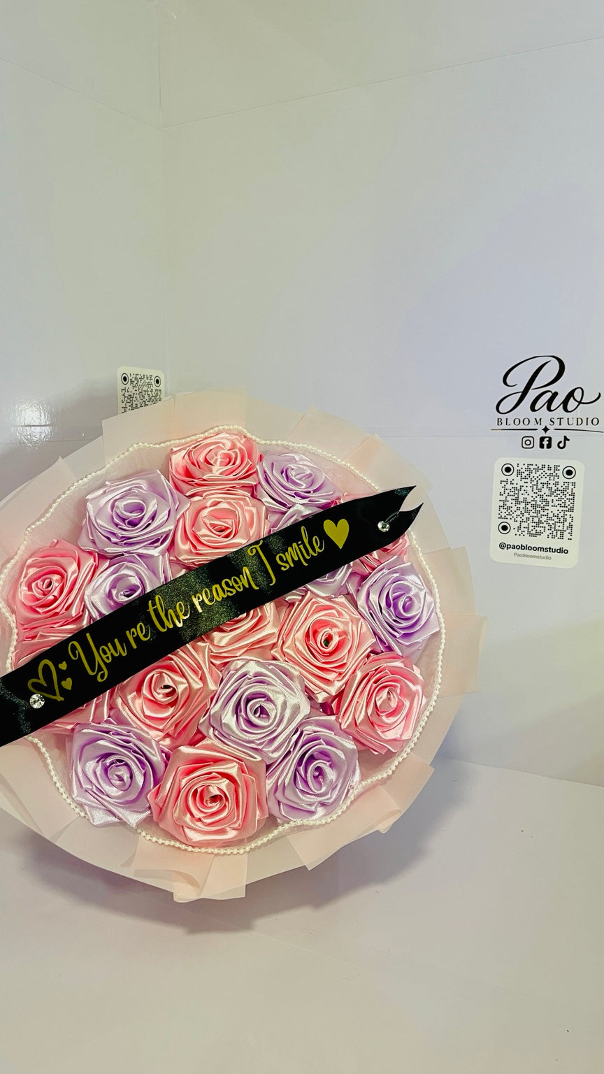 Full pink and lavender satin rose bouquet with custom message ribbon