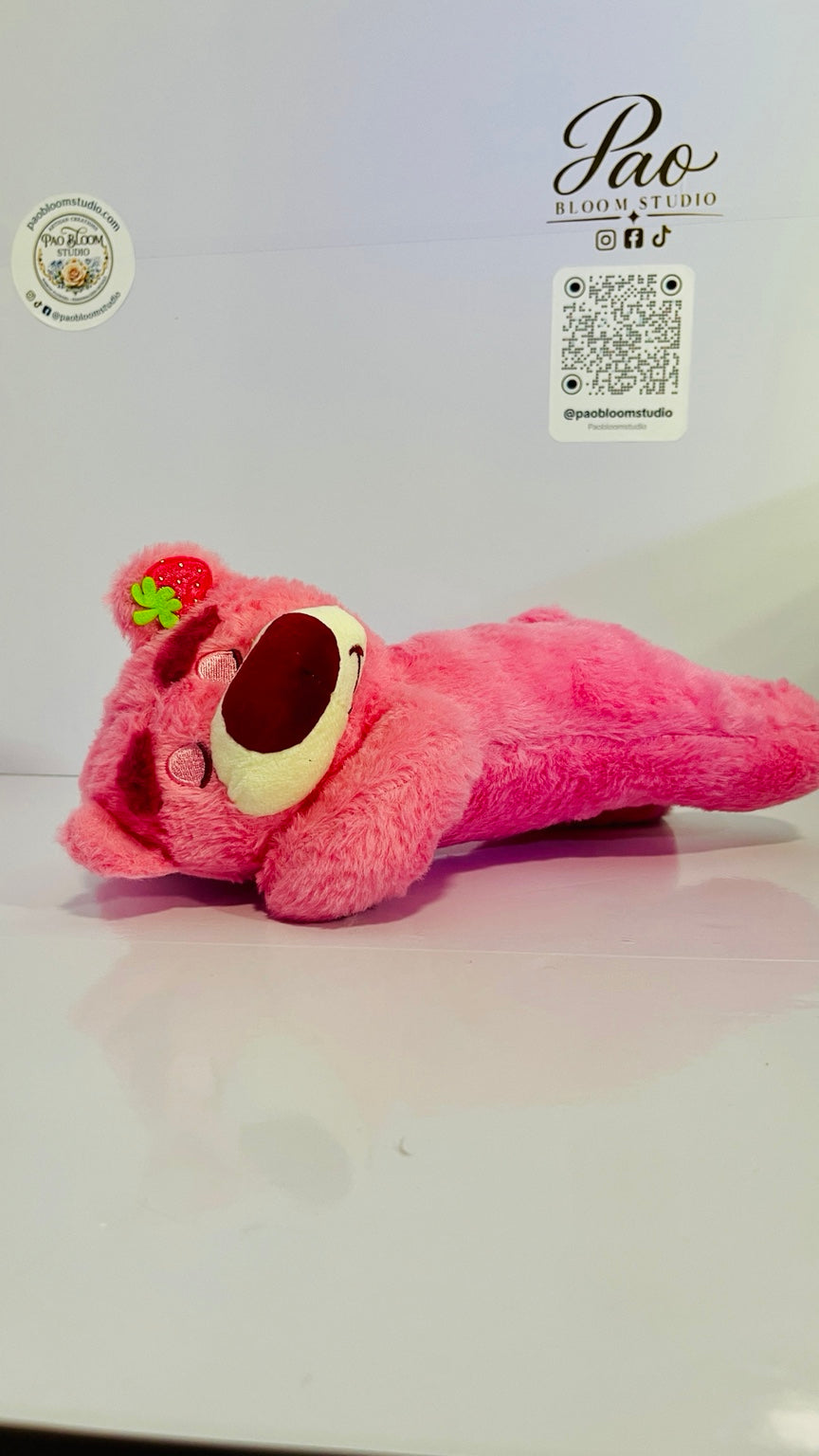 Pink strawberry bear plush 28 cm angled view