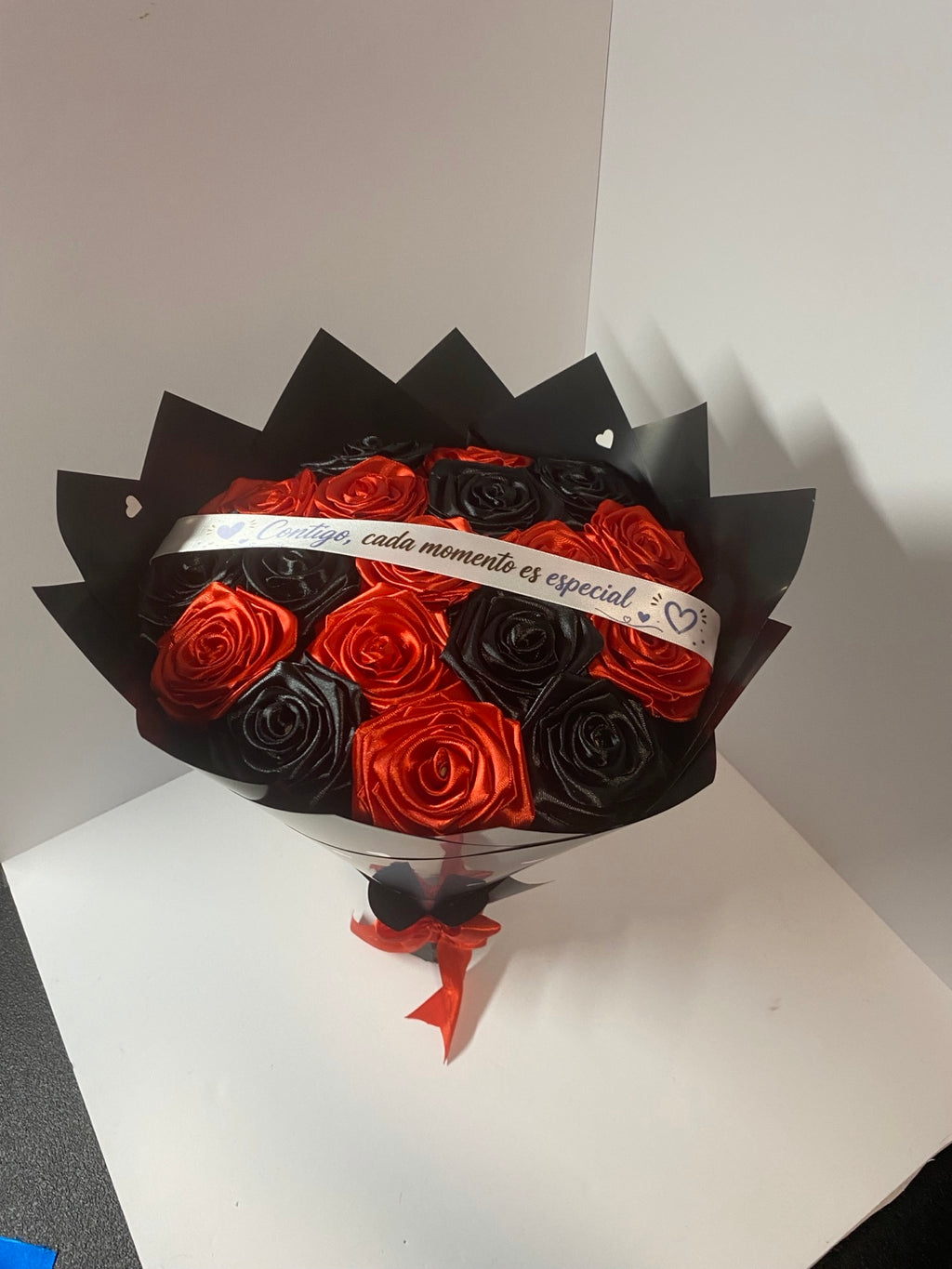 Red and black handmade satin rose bouquet, front view
