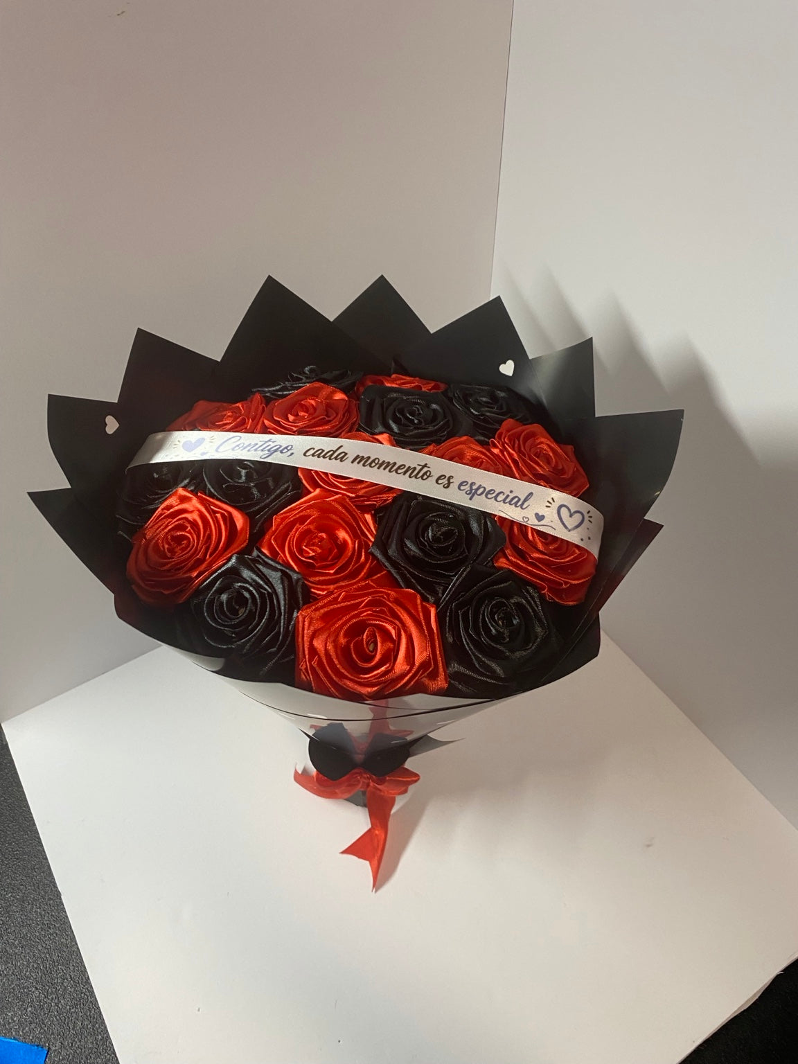 Red and black handmade satin rose bouquet, front view