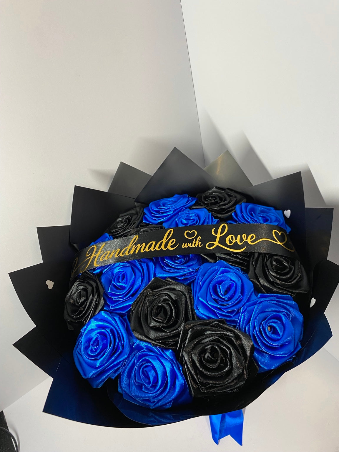 Royal blue and black handmade satin rose bouquet, front view