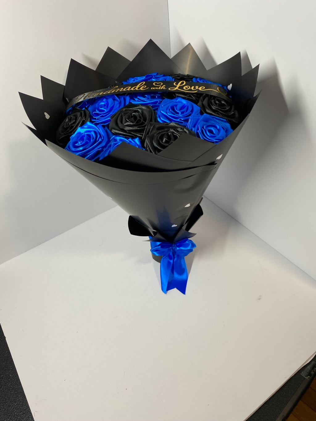 Royal blue and black satin rose bouquet, side view